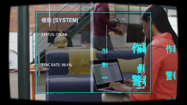 Vertical video: Woman typing on laptop in IT office man walking activating HUD indicating sync