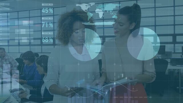 Camera zooming in, two businesswomen flipping brochure, pointing at animated charts for data review