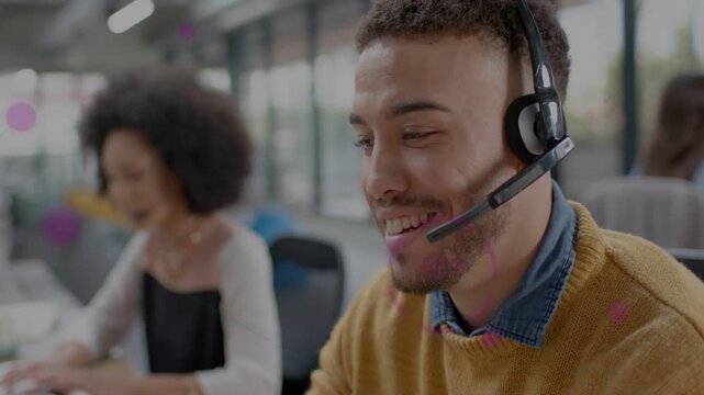 Male support agent answering incoming call, headset showing animated script, fixing customer issue