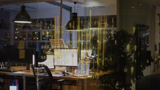 Desk showing overlay emerging from screens, reflecting yellow numbers arrows, visualizing tech data