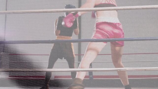Two female boxers sparring pink-shorts boxer pressing to clinch animated sparks marking gloves