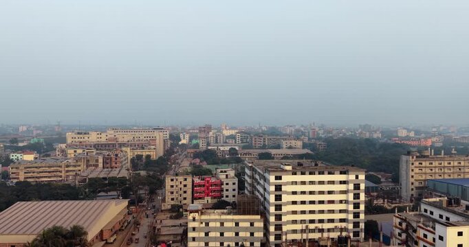 Cityscape with buildings and trees in a densely populated urban area city architecture skyscrapers streets roads