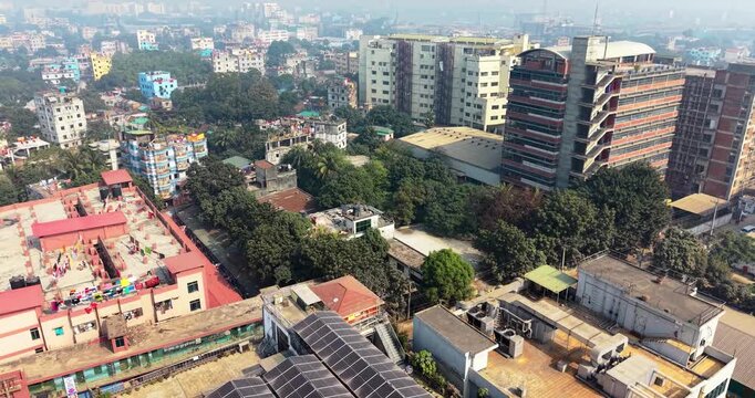 Aerial view of a densely populated urban area with trees and buildings city architecture