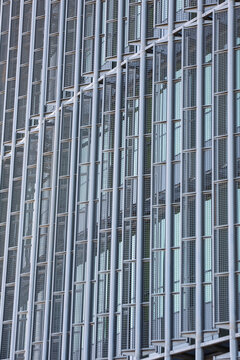 Modern Industrial Building Facade with Metallic Grids geometric architectural design