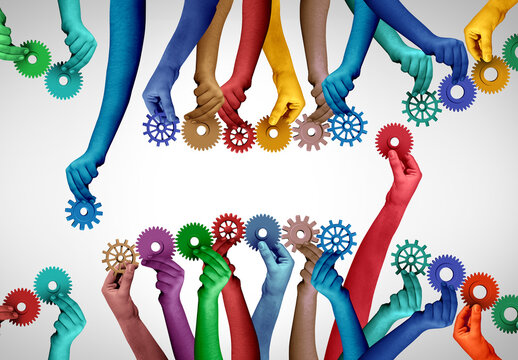 Business Group Exchange as members or employees from two team groups Joining and filling in the gaps as individuals join a chain of workers or employees connected together as diverse hands holding gea