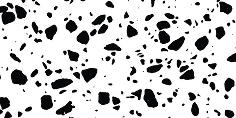 Fototapeta premium A high-contrast monochrome seamless terrazzo pattern presenting numerous irregular black shapes scattered across a clean white surface.