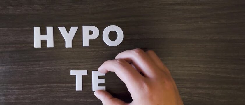 the word hypotension written on a dark background with white block letters or capital letters (fast version)
