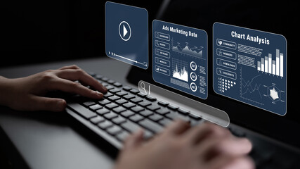 Naklejka premium Person Using Laptop with Digital Marketing Dashboard and Charts for Data Analysis in a Modern Office Environment Quark.