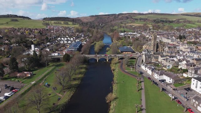 Historic urban landscape of Peebles showcasing traditional stone architecture and ancient heritage buildings along the banks of River Tweed.