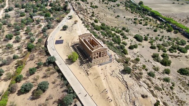 Rising aerial orbit of Greek Temple of Concordia showcasing Doric Columns