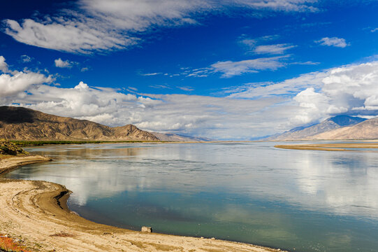 Scenic View of the Lhasa River and Mountains
