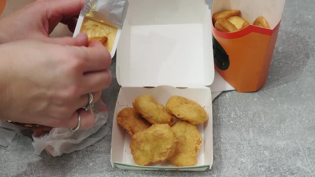 Fast food delivery menu background with various burgers, cheeseburger, nuggets, french fries, fizzy soda drinks. Junk unhealthy fast food, Ultra processed food with low nutrition, high calories value