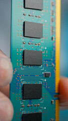 RAM Unit of the computer or DRAM, Dynamic Random Access Memory chips display. Concept of AI boom and massive shortage of RAM, driving prices high as tech giants hoard components for data centers. © ﻿ MotionPixxleStudio