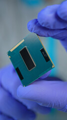 Scientists and engineer shows CPU Central Processing Unit in the hand. Concept of AI boom triggered a massive shortage of CPUs, driving prices high as tech giants hoard components for data centers © ﻿ MotionPixxleStudio
