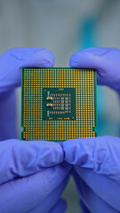 Scientists and engineer shows CPU Central Processing Unit in the hand. Concept of AI boom triggered a massive shortage of CPUs, driving prices high as tech giants hoard components for data centers © ﻿ MotionPixxleStudio