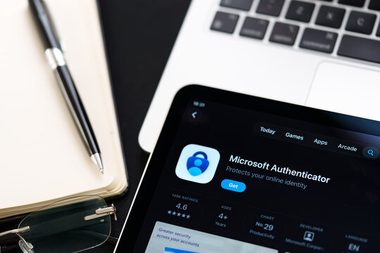 Microsoft Authenticator iPad App Store screen showing Apple Liquid Glass redesign and iOS 26 style in workspace closeup. Stafford, United Kingdom, April 13, 2026.