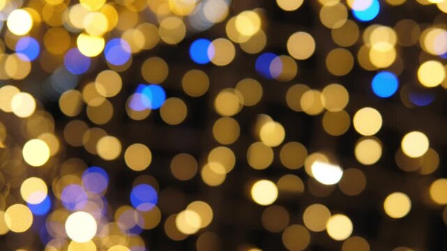 Blue And Gold Shimmering Background. Sparkling Gold And Blue Effects Evoke Joyful Seasonal Atmosphere. Rich Shimmering Tones Of Gold And Blue Set Lively Festive Scene With Bright Accents