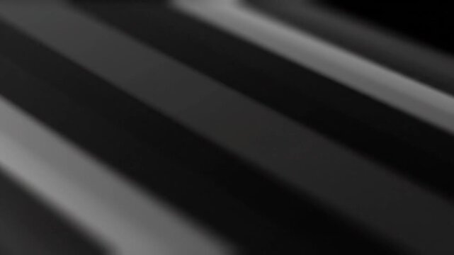 Abstract dark background with diagonal light and shadow stripes pattern