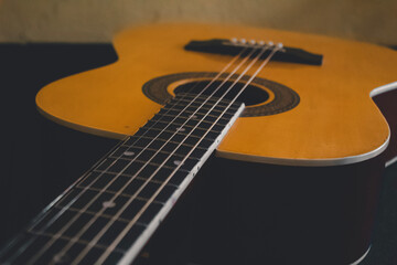 Fototapeta premium Luminous Acoustic Body and Rhythmic String Alignment