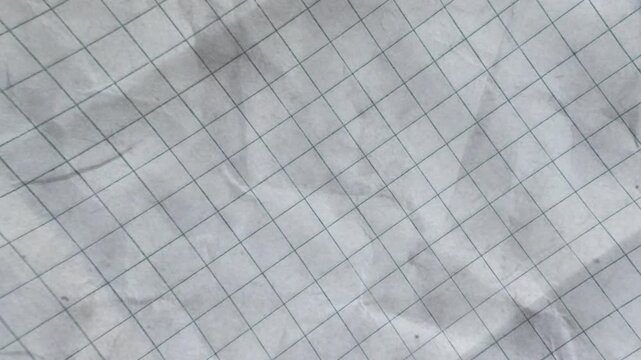 Moving Abstract Background of Crumpled Grid Paper Texture