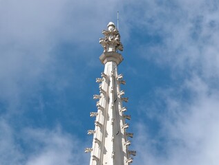 Decorative stone pinnacle. Ornamental stone sculpture showcasing spikes and intricate carvings © Vladimir