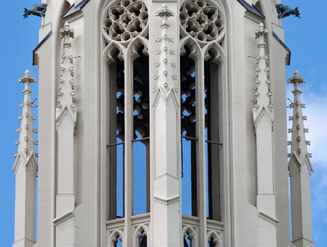 Ancient religious bell structures with ornate carvings and towering spires serve cultural significance