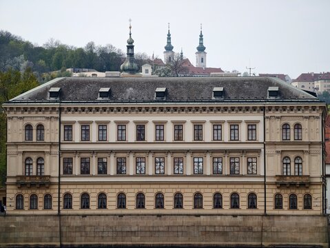 Symmetrical architecture with reflective water. Classical style with balanced windows and stone details