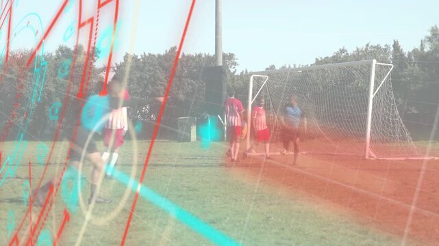 Soccer attacker striking ball to score, backs jumping to block, GK diving, HUD overlay hiding field