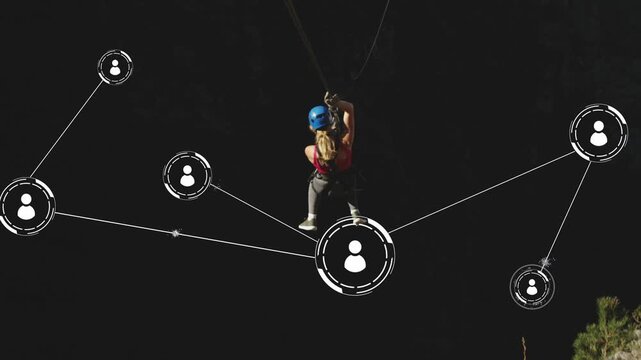 Woman starting ziplining over gorge while animated nodes surrounding her, visualizing tech network