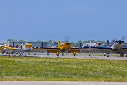 Full Throttle Formation Team: 12 Rvs taxi-ing back to their parking place at Sun n Fun 2026