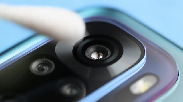 Macro close up of a smartphone camera lens on back
