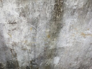 Obraz premium Grey weathered concrete wall with grainy texture