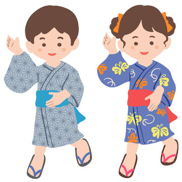 浴衣を着て踊る子供たち