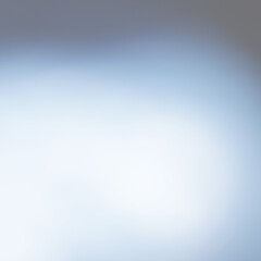 Obraz premium Una toma de cerca de un fondo abstracto azul y blanco un degradado ligero desenfocado