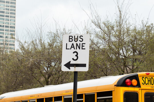 Horizontal photo of a 'Bus Lane 3' sign, indicating a designated lane for buses, ensuring smooth traffic flow and public transportation priority in the U.S