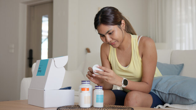 Young asia people woman buy custom tailor made anti aging pill bottle diet immune plan online health care shop open gift box weight loss herbal. Unbox order store clinic home service life balance.