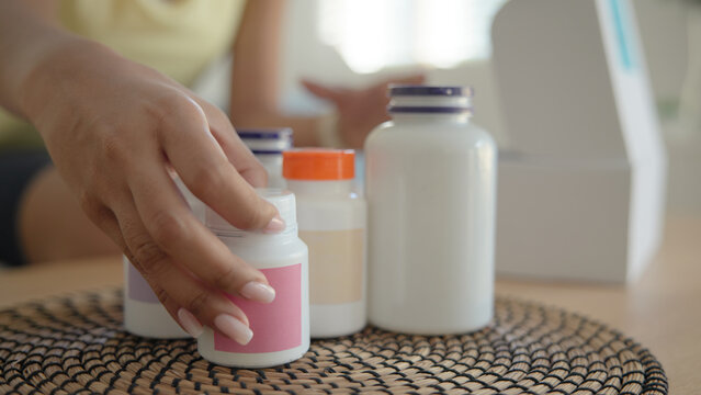 Young asia people woman buy custom tailor made anti aging pill bottle diet immune plan online health care shop open gift box weight loss herbal. Unbox order store clinic home service life balance.