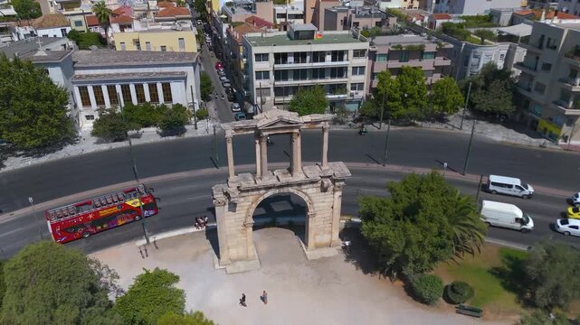 Athens, Greece: Aerial view of Hadrian&rsquo;s Arch and the ancient ruins of Athens on a sunny day.