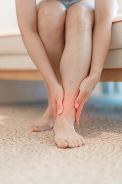 woman having leg pain due to Ankle Sprains or Achilles Tendonitis and Shin Splints ache. injury, hyperuricemia disease and Gout. Health care and medical treatment  concepts