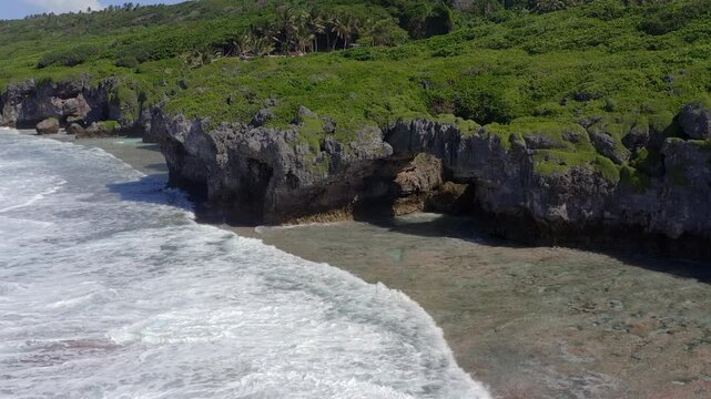 Aerial Drone View of Waves Breaking on Tropical Coast in Niue