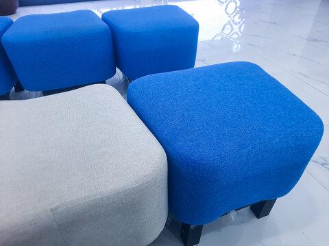waiting room with blue and white chairs