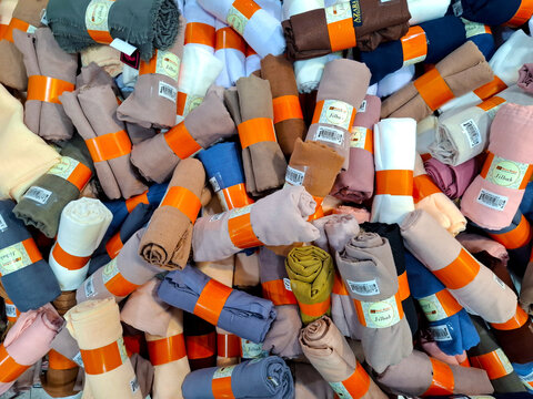 Colorful Jilbab Collection Neatly Rolled and Stacked for Sale on March 18th 2026 in Yogyakarta, Indonesia