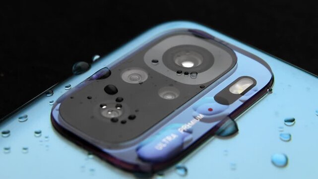 Macro close up of a smartphone camera lens on back
