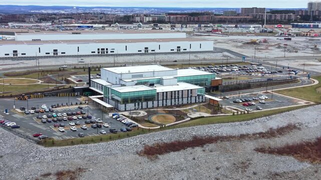drone aerial shot of Centre Hospitalier Laval and Bayers Lake Community Outpatient Centre in Halifax, Nova Scotia, Canada. Overview of hospital buildings, access roads and large parking areas 4K.