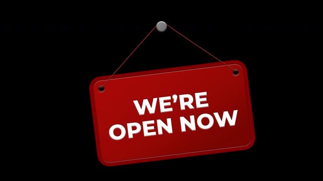 Red hanging sign with we are open now text on black background for retail store business front door and welcome information.