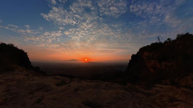 Beautiful sunrise over la malinche volcano seen from a rocky viewpoint in mexico