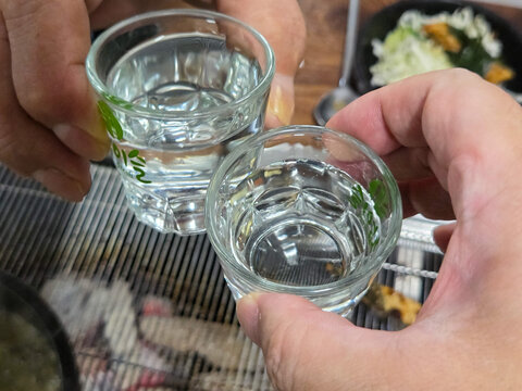 clear korean distilled spirit soju in a small glass