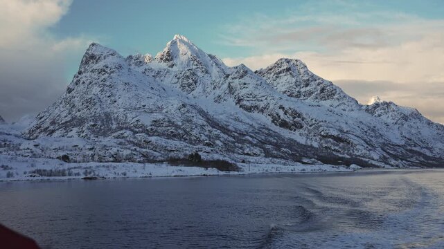 Spectacular snowy Lofoten island Trollfjord Norway view from a boat