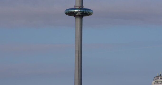 Speeded up shot of the Brighton i360 going down the tower, column