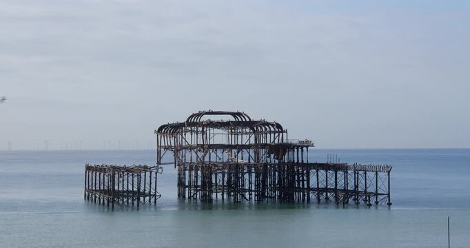 Extra Wide shot of the Dialect Brighton West pier on a Calm day